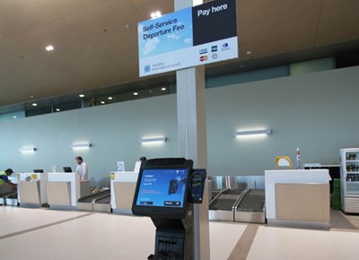 Kiosk for departure fee ticket sales - NCR kiosk with receipt printer